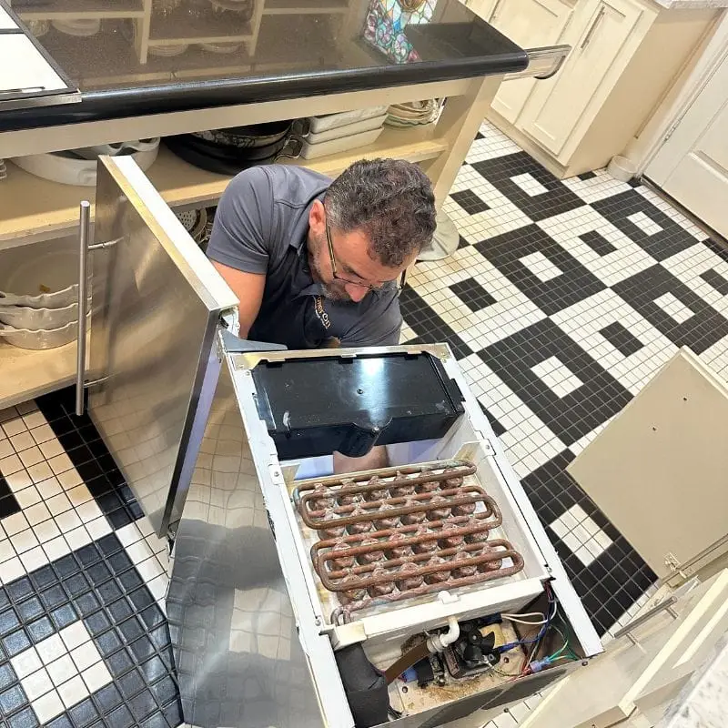 PowerOn Appliance Repair Service technician servicing scotsman ice machine