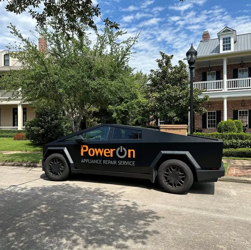 PowerOn Appliance Repair Service work truck in The Woodlands, TX. front of customer house