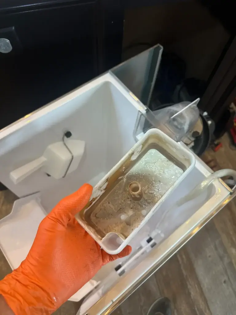 PowerOn Appliance Repair Service technician working on Hoshizaki ice machine in Montgomery, TX.