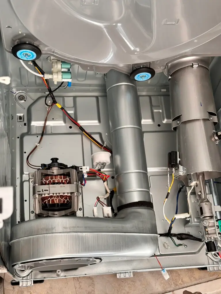 PowerOn Appliance Repair Service technician working on dryer