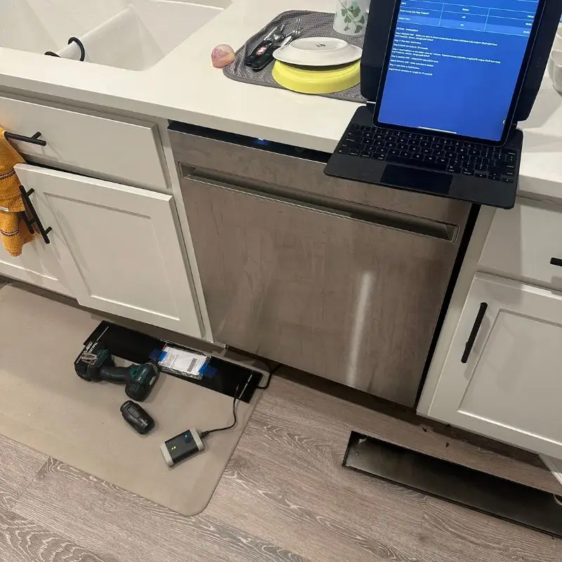 PowerOn Appliance Repair Service technician troubleshooting GE dishwasher in Spring, TX