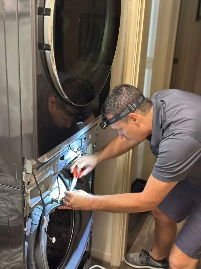 PowerOn Appliance Repair Service technician working on LG washer