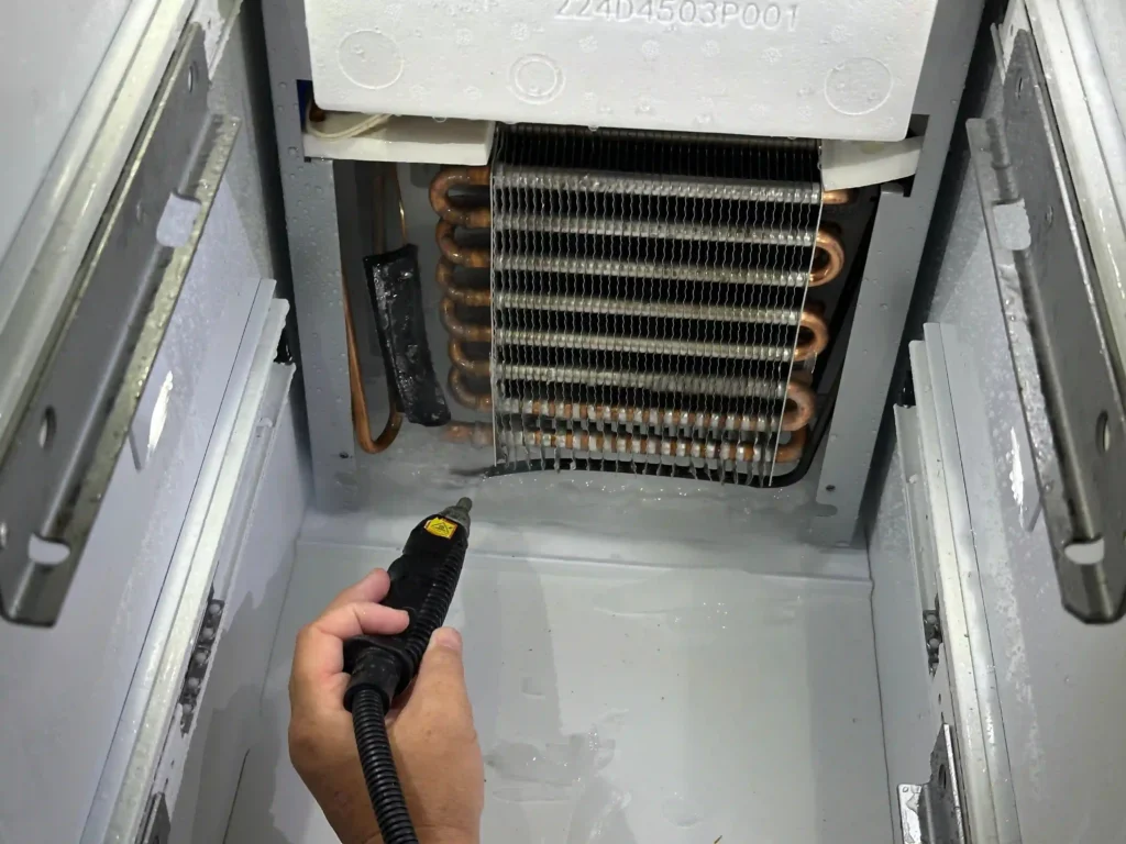 Defrosting process ice from ge freezer floor