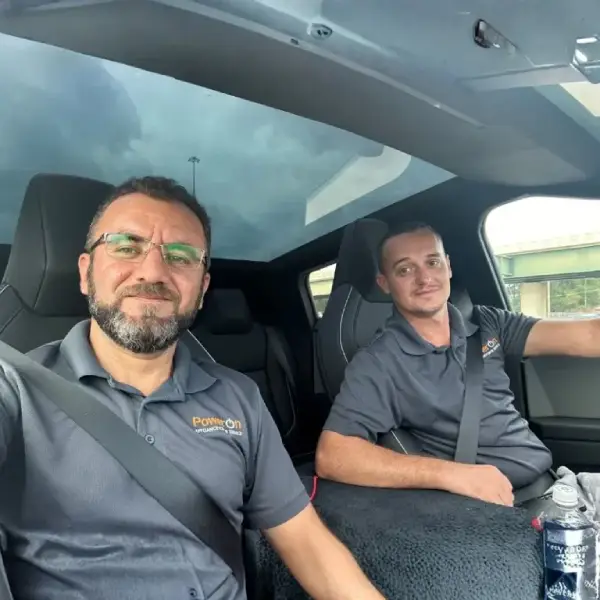 PowerOn Appliance Repair Service technicians in the service truck - Cybertruck