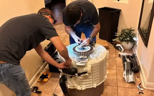 PowerOn Appliance Repair Service technicians working on Samsung Front load washer