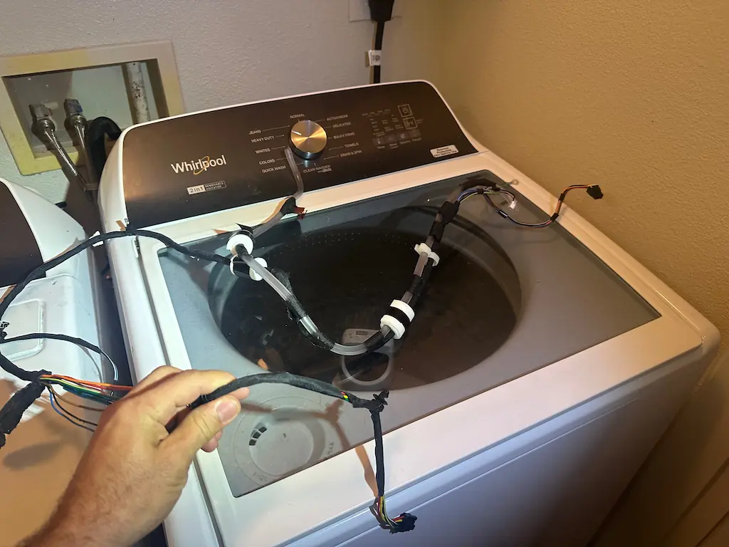 PowerOn Appliance repair tech replaced whirlpool washer wire harness