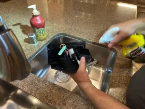 GE refrigerator dispenser cleaning