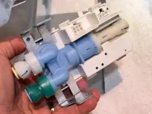 Old dual water inlet valve removed from Thermador refrigerator, The Woodlands TX