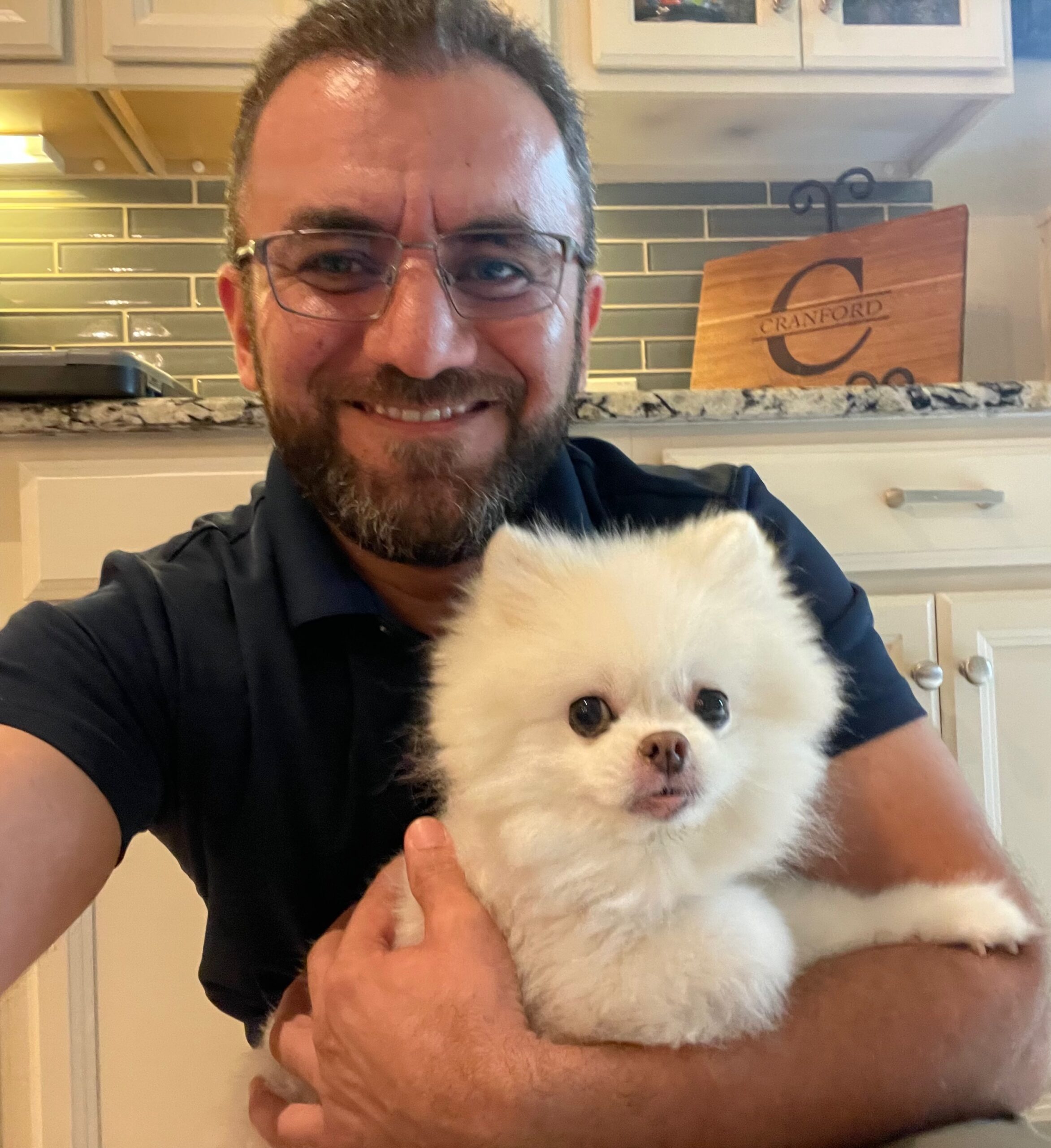 Milo, a pet met during a PowerOn appliance repair visit in The Woodlands, TX