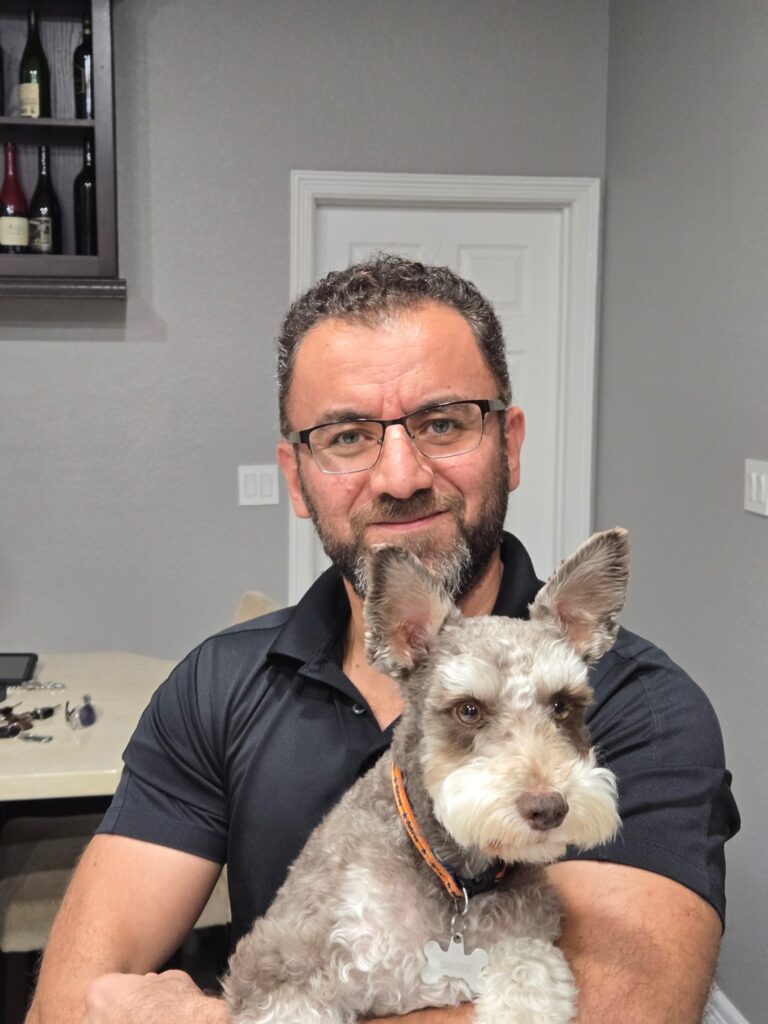 PowerOn Appliance Repair Service technician with customer pet in Willis, TX